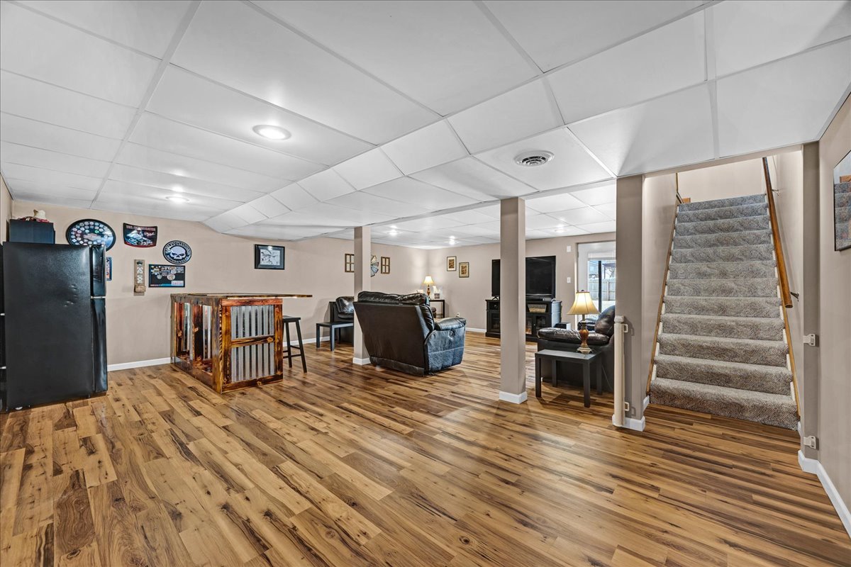 505 West North Street Danvers, IL 61732 - Photo 23 of 45 a room with lots of wooden furniture and a view of bedroom