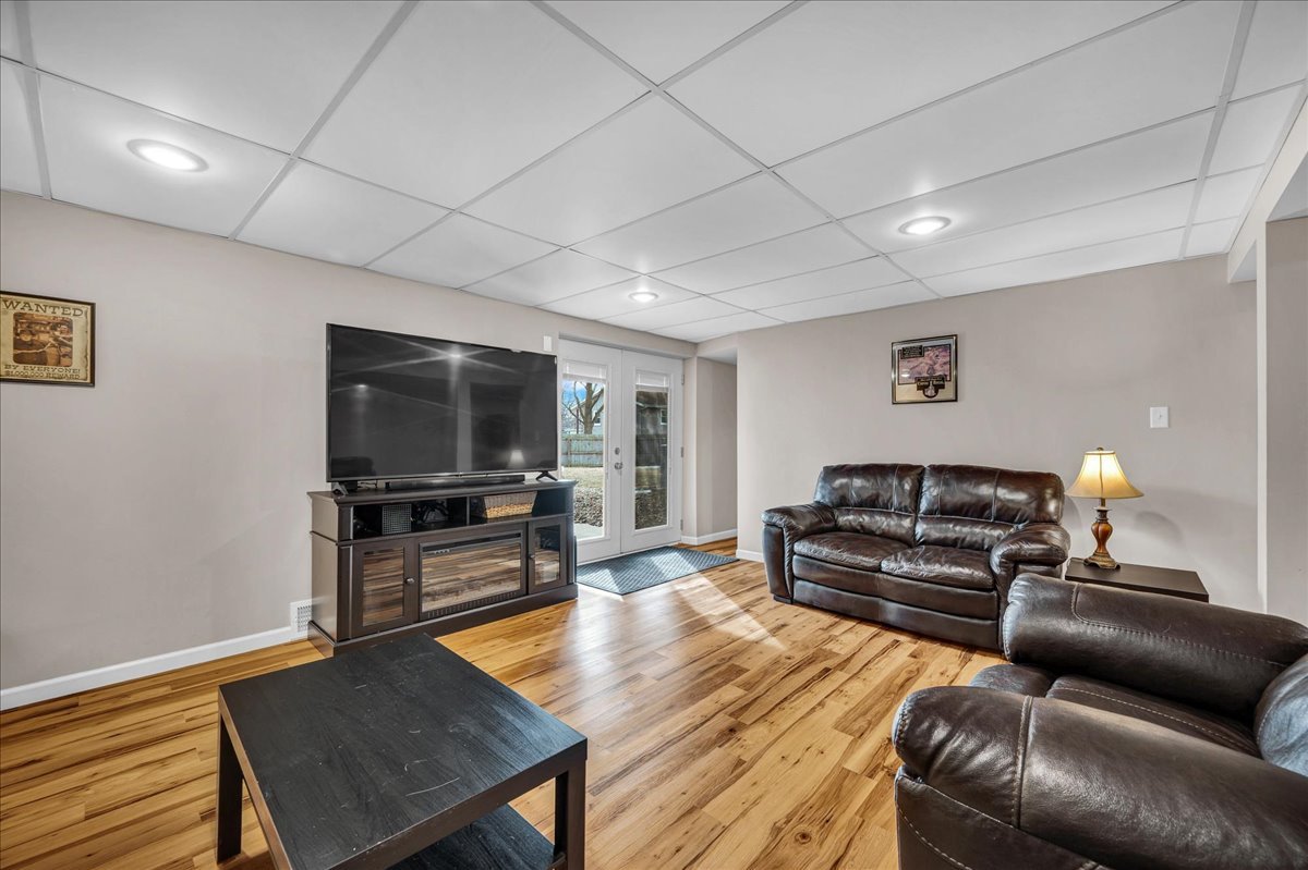 505 West North Street Danvers, IL 61732 - Photo 26 of 45 a living room with furniture and a flat screen tv