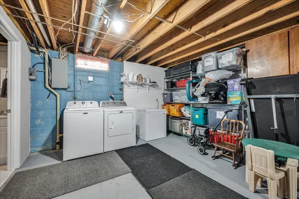 a utility room with dryer and washer