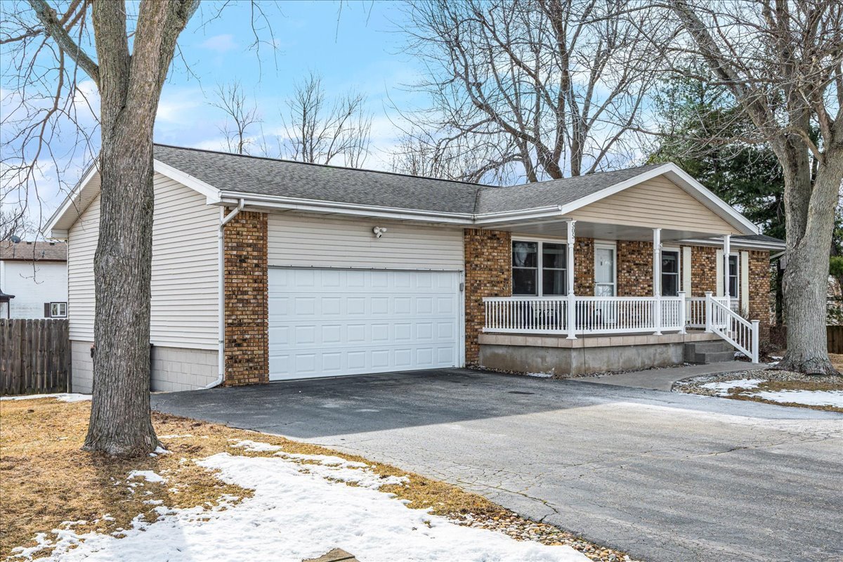 505 West North Street Danvers, IL 61732 - Photo 33 of 45 a front view of a house with a yard and garage