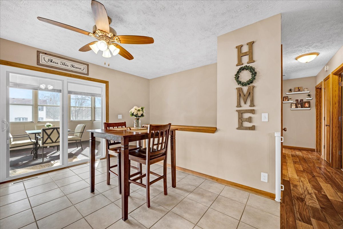 505 West North Street Danvers, IL 61732 - Photo 10 of 45 a view of a dining room with furniture and a chandelier fan