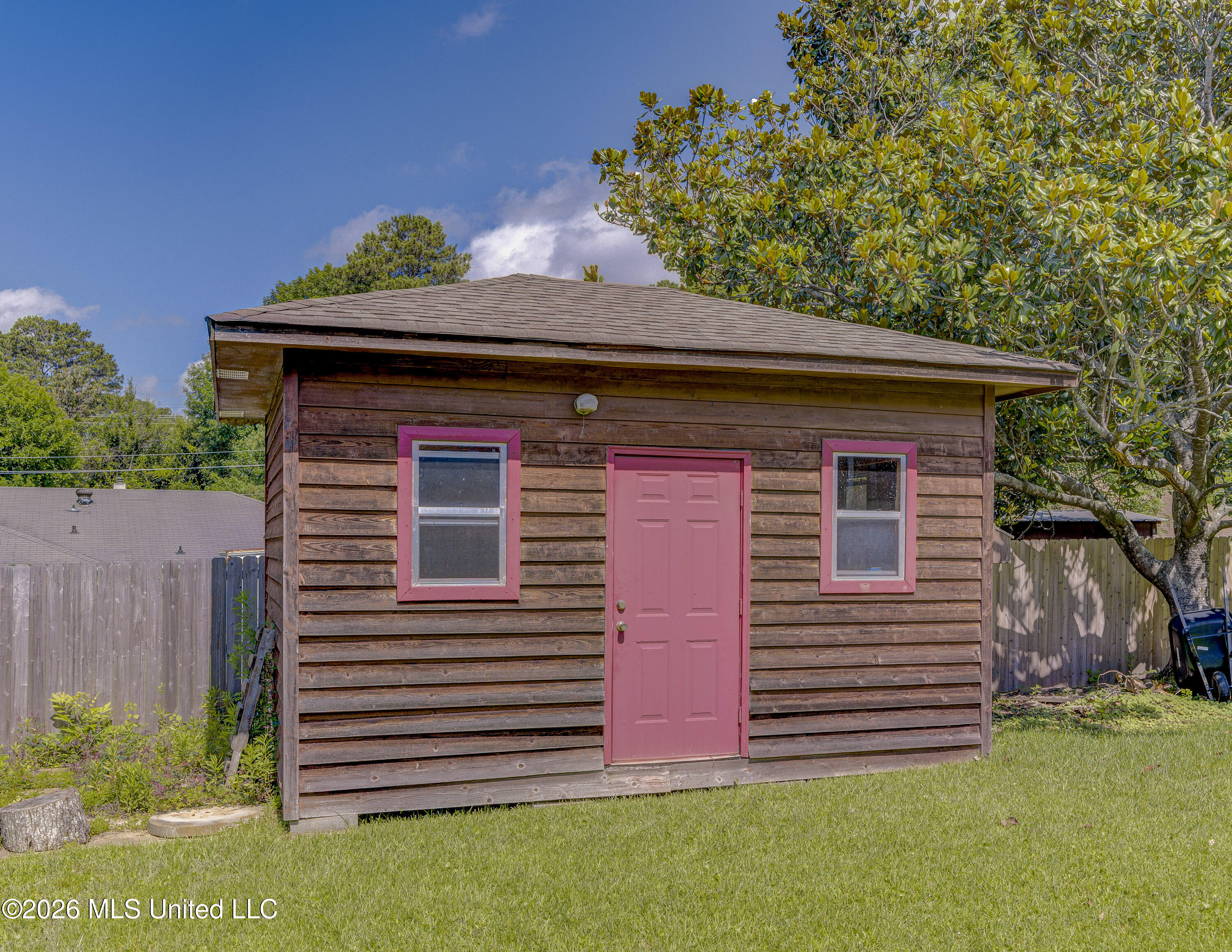 103 Erin Cove Clinton, MS 39056 - Photo 35 of 39 36 Backyard Storage Building Exterior
