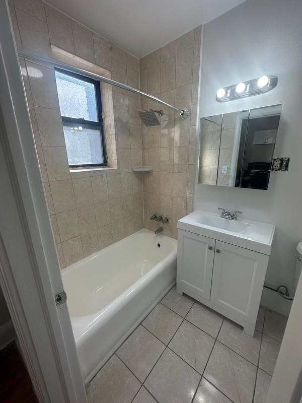 1 Noll Place, Unit 2 Newark, NJ 07106 - Photo 3 of 10 a bathroom with a bathtub a sink a toilet and a mirror