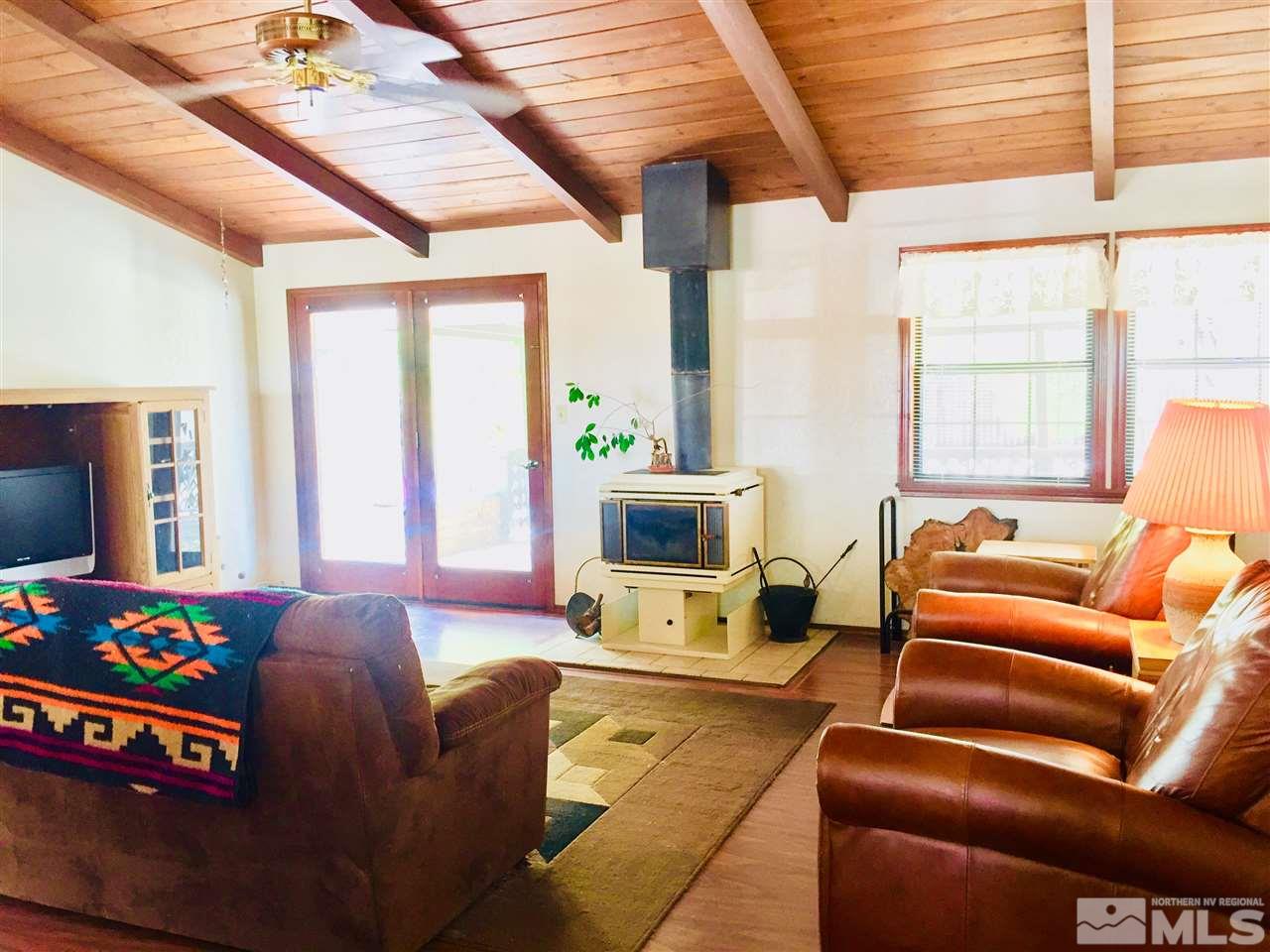 2277 Soda Lake Road Fallon, NV 89406 - Photo 3 of 25 a living room with furniture and a flat screen tv