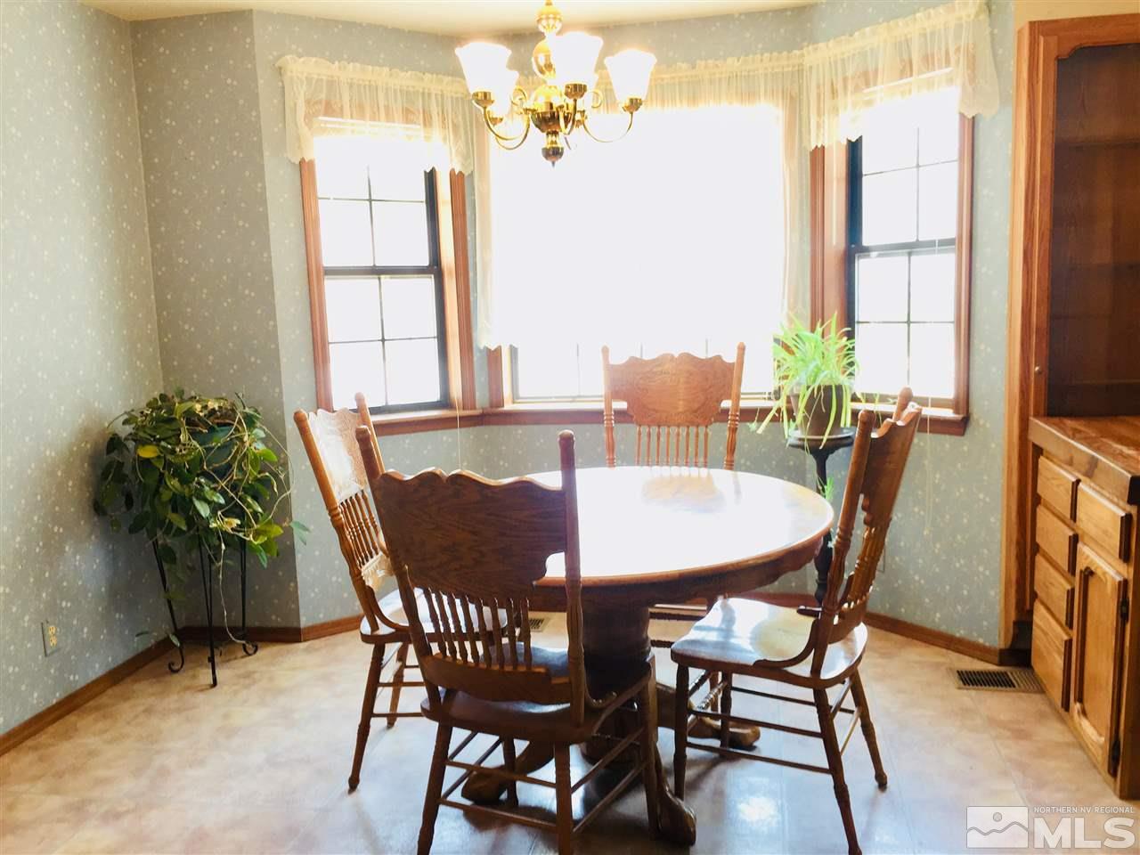 2277 Soda Lake Road Fallon, NV 89406 - Photo 8 of 25 a dining room with furniture and window