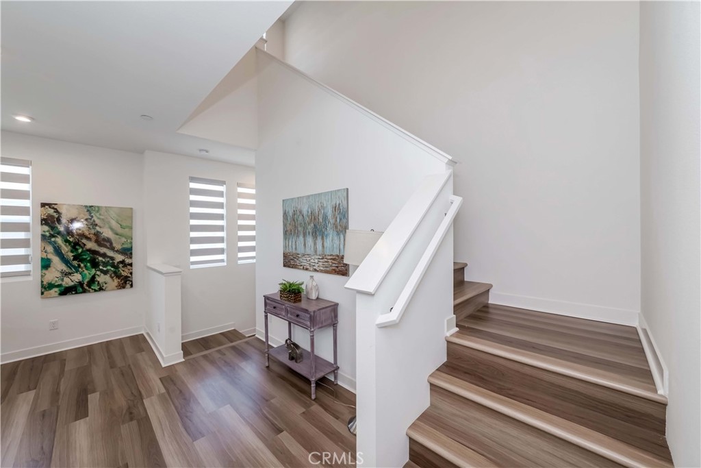 1403 West Bushell Street Anaheim, CA 92805 - Photo 13 of 34 a view of entryway and hall with wooden floor