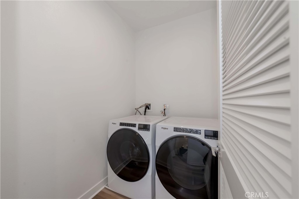 1403 West Bushell Street Anaheim, CA 92805 - Photo 14 of 34 a utility room with dryer and washer