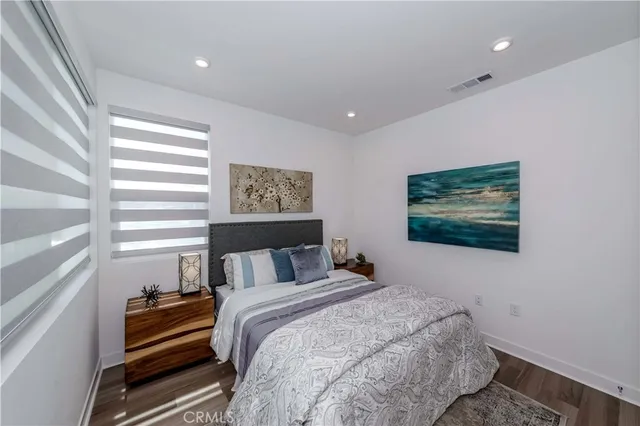 a bathroom with a shower a toilet and a sink