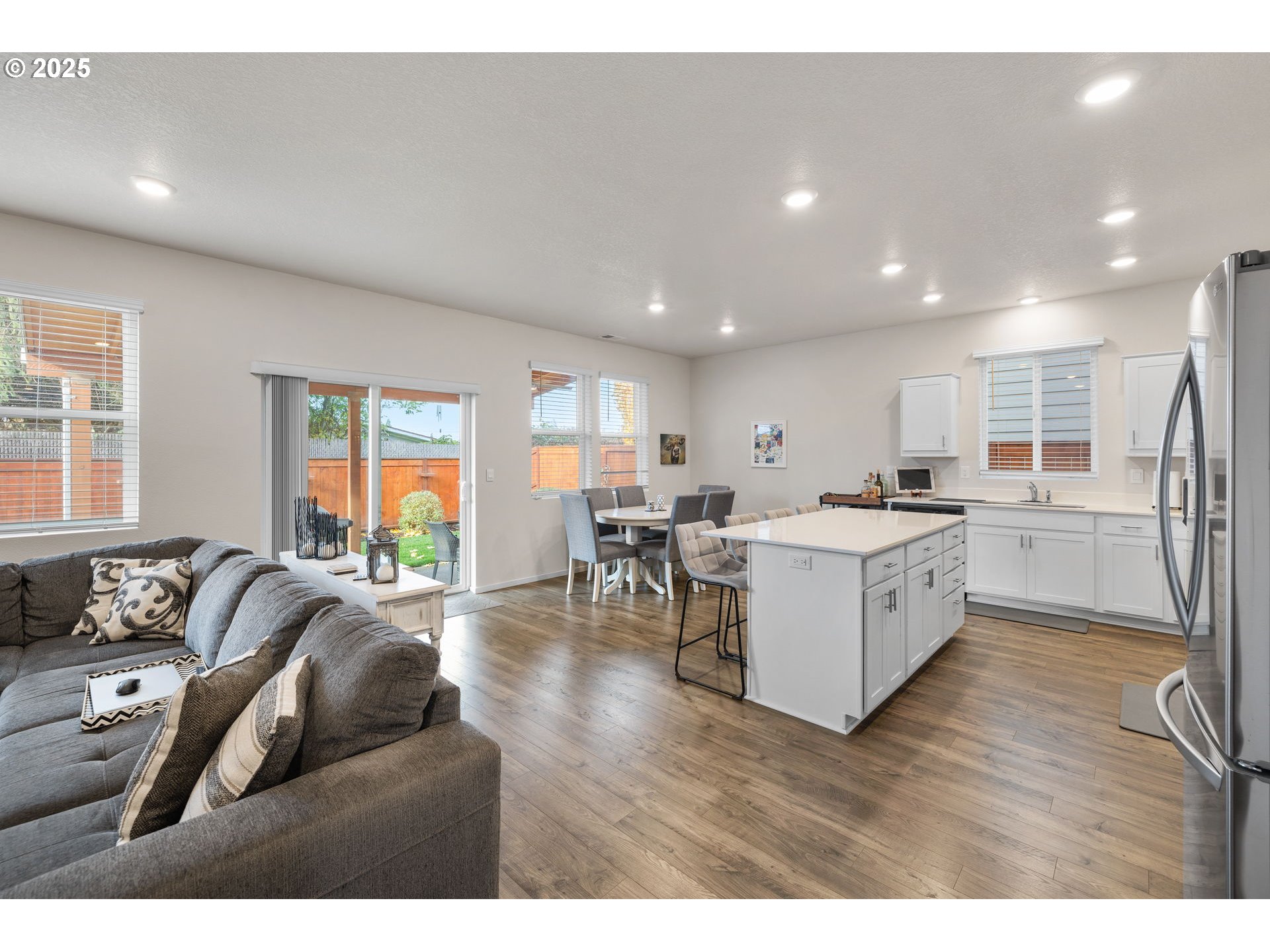 371 Himalaya Street Salem, OR 97301 - Photo 12 of 34 a living room with furniture and a wooden floor