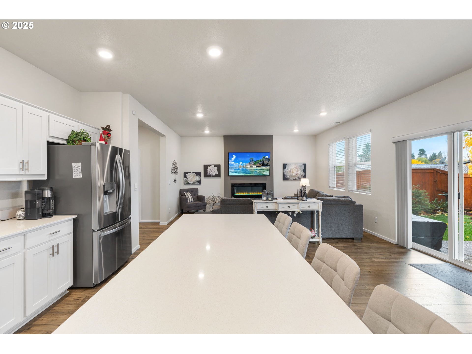371 Himalaya Street Salem, OR 97301 - Photo 18 of 34 a living room with stainless steel appliances kitchen island furniture and a view of kitchen