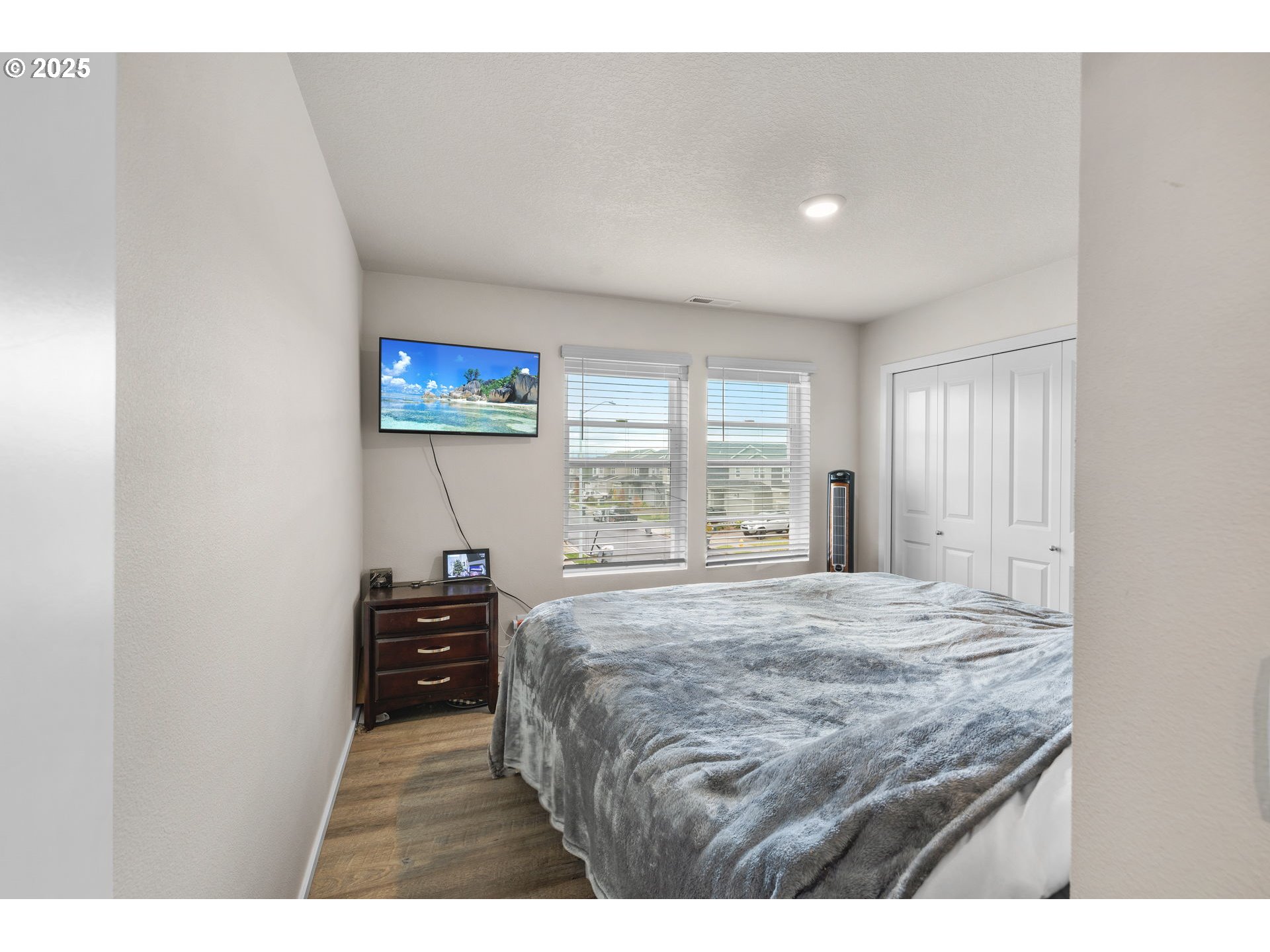 371 Himalaya Street Salem, OR 97301 - Photo 30 of 34 a room with a bed window and a flat screen tv