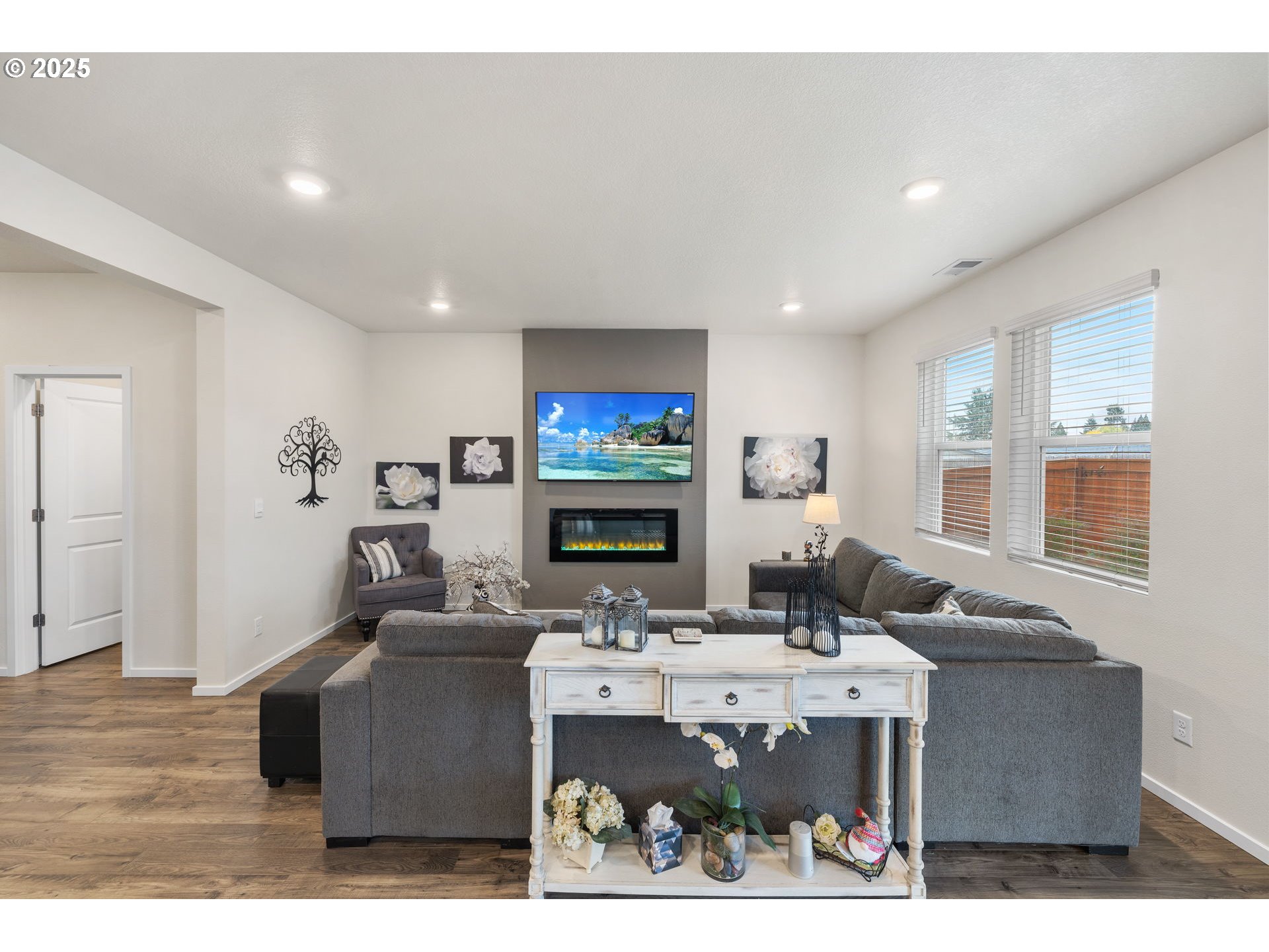 371 Himalaya Street Salem, OR 97301 - Photo 9 of 34 a living room with furniture a rug and a flat screen tv