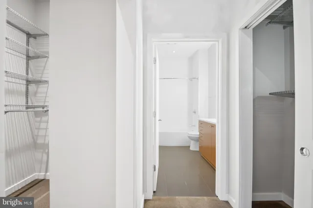 a bathroom with a sink a toilet and a bathtub