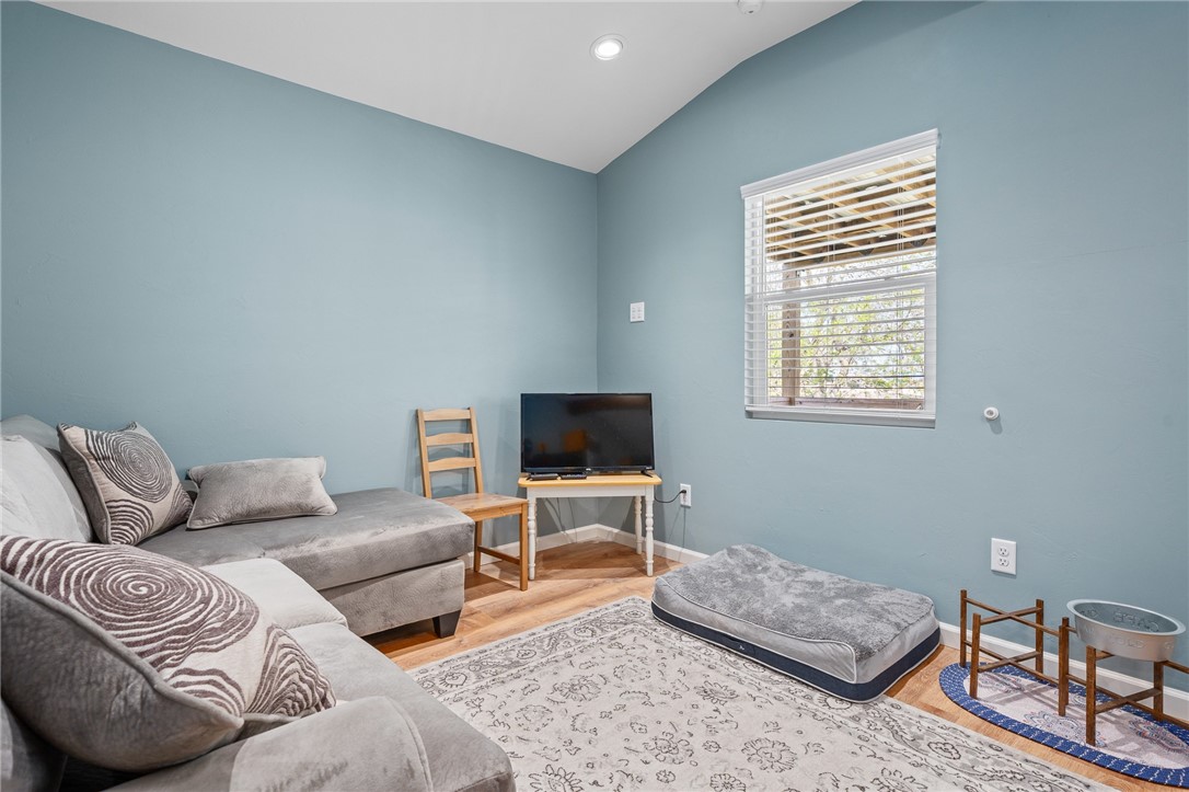 726 3rd Street Bayside, TX 78340 - Photo 15 of 40 a living room with furniture and a flat screen tv