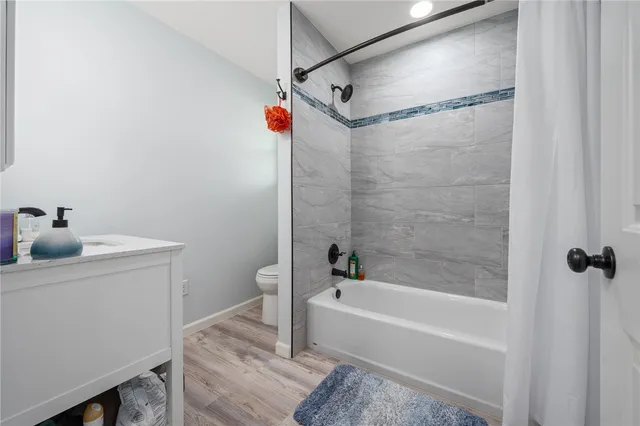 a room with cabinets and dust bin