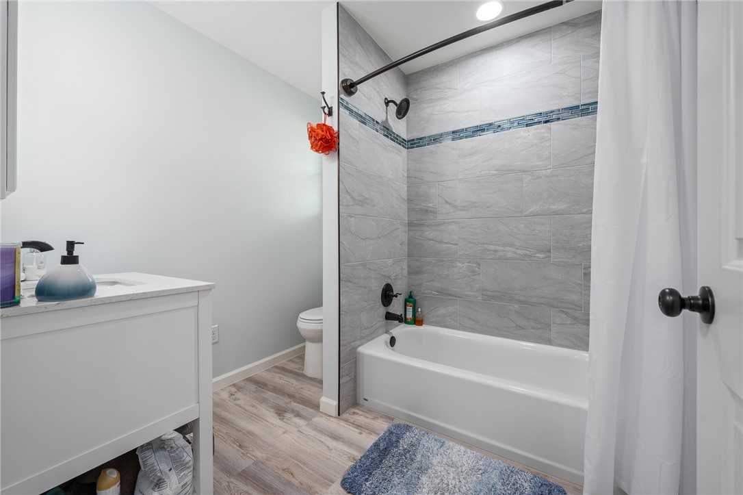 726 3rd Street Bayside, TX 78340 - Photo 17 of 40 a bathroom with a bathtub and shower