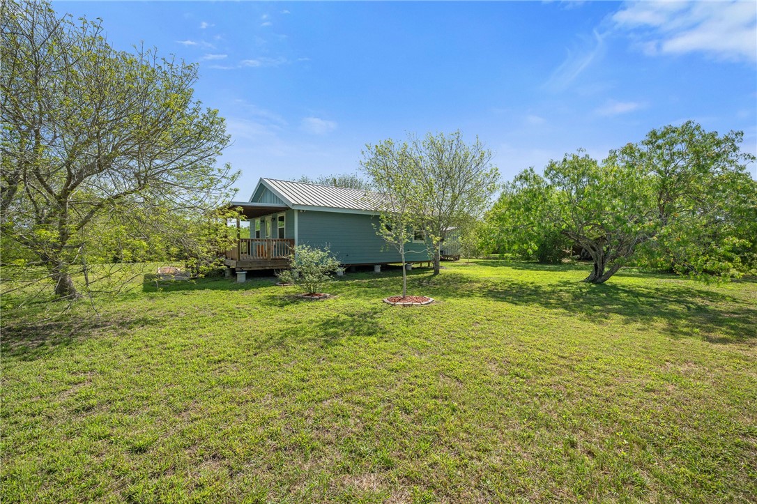 726 3rd Street Bayside, TX 78340 - Photo 5 of 40 a view of a house with a yard