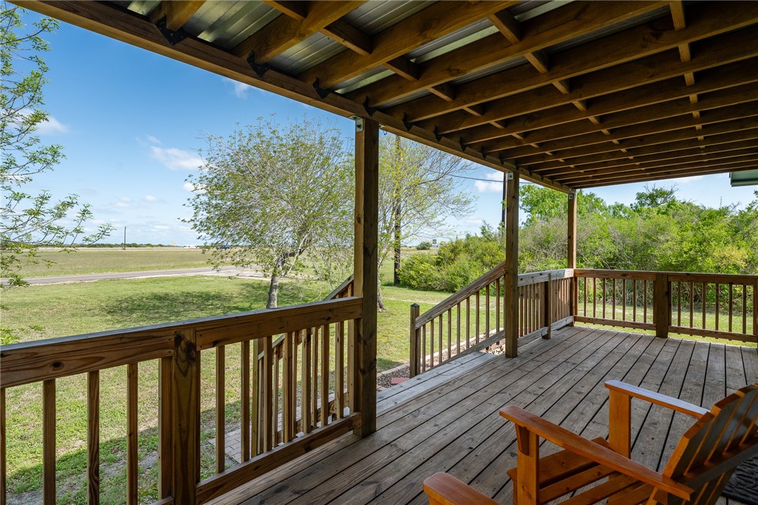 726 3rd Street Bayside, TX 78340 - Photo 7 of 40 a view of a balcony with wooden floor