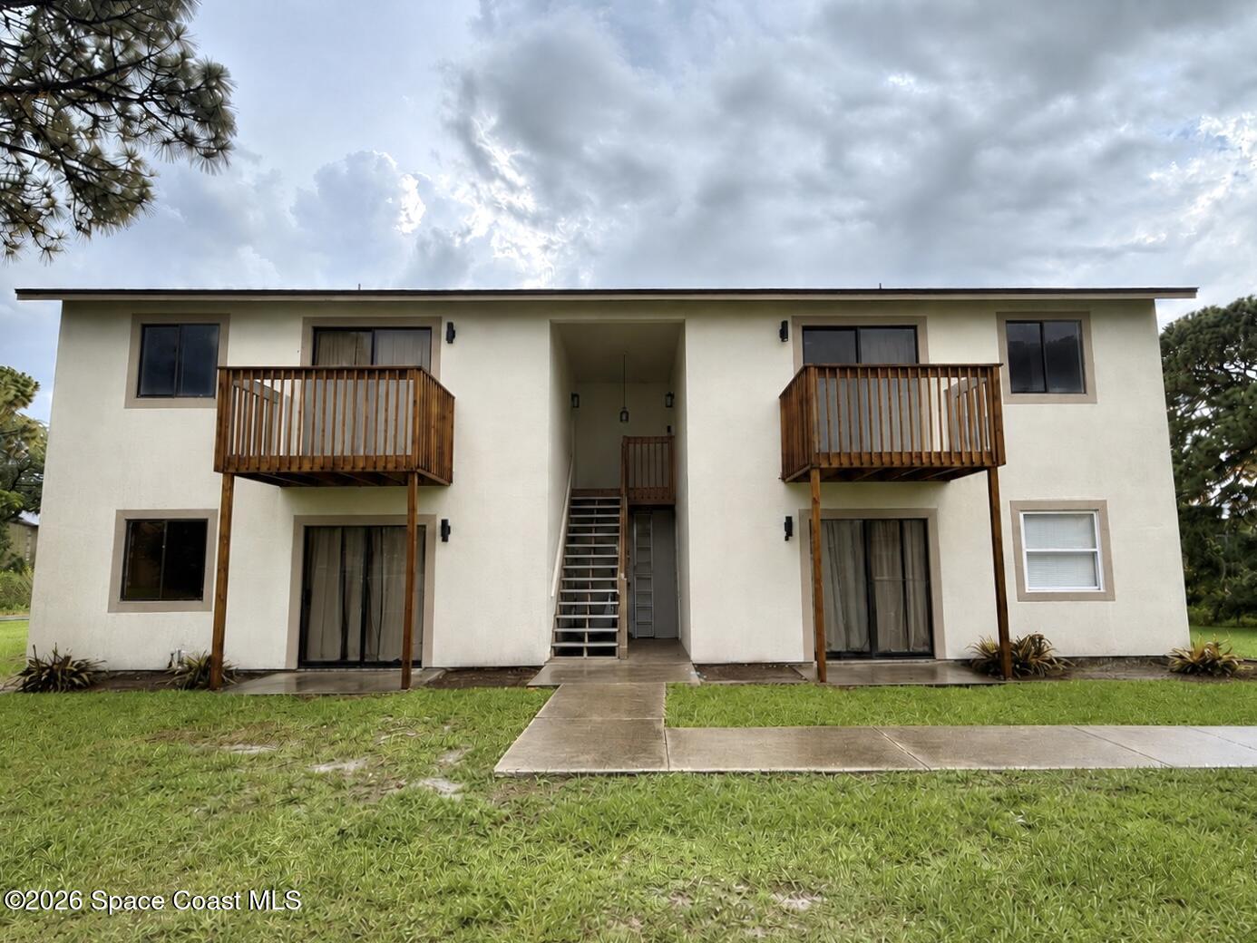 2624 Tree Ridge Lane Northeast Palm Bay, FL 32905 - Photo 1 of 18 Front Exterior of Quadplex - Unit 2624