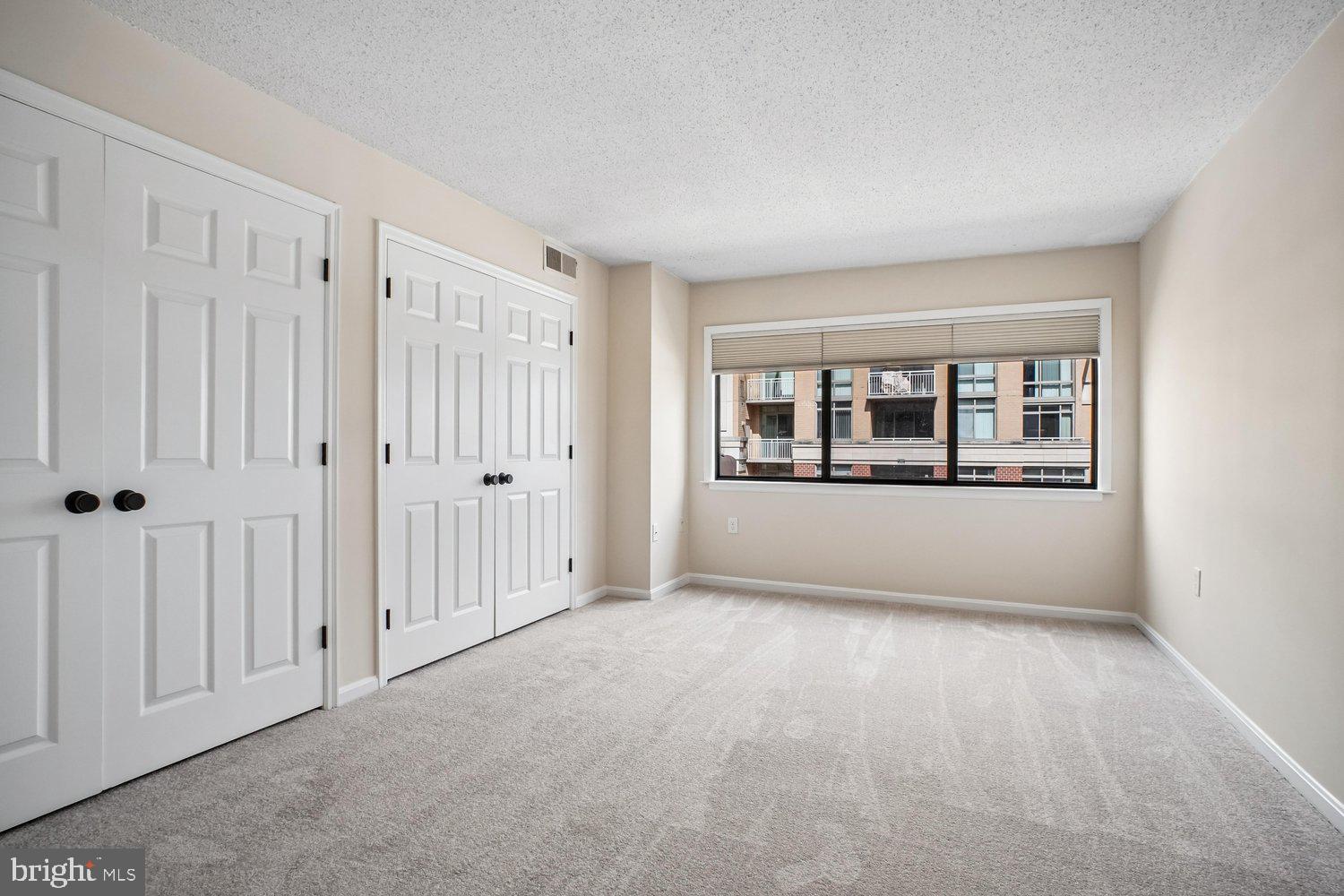 1301 North Courthouse Road, Unit 1612 Arlington, VA 22201 - Photo 21 of 52 Primary Bedroom w/New Carpet & Paint