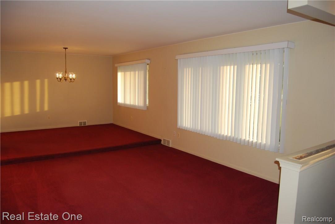 1296 North Adams Road Rochester, MI 48306 - Photo 7 of 23 LIVING ROOM & DINING ROOM