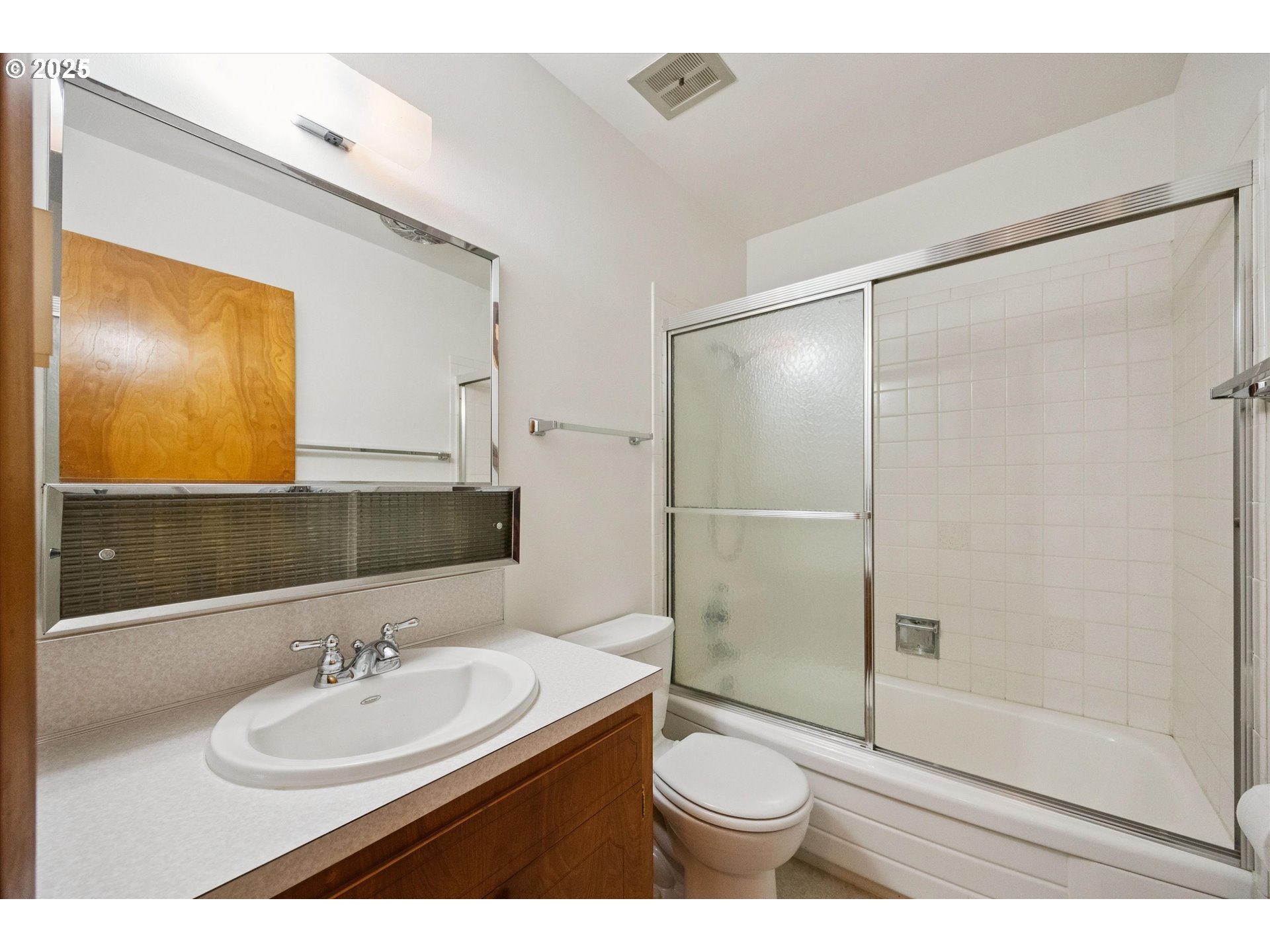 121 Southeast 166th Avenue Portland, OR 97233 - Photo 22 of 27 a bathroom with a sink toilet and shower