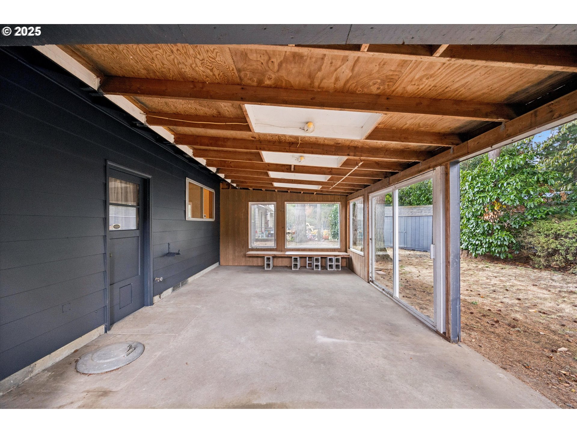 121 Southeast 166th Avenue Portland, OR 97233 - Photo 25 of 27 a view of a room with wooden walls