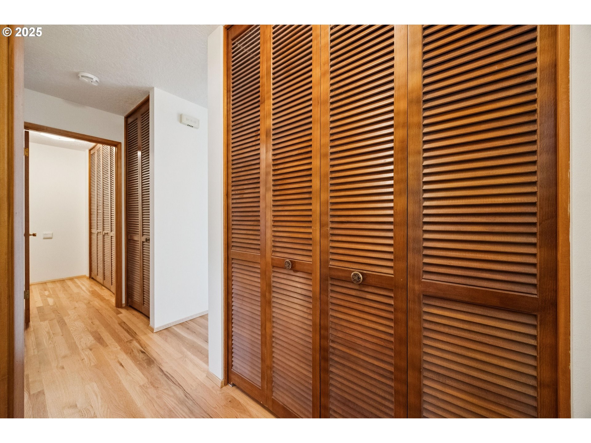 121 Southeast 166th Avenue Portland, OR 97233 - Photo 26 of 27 a view of a room with a wooden floor
