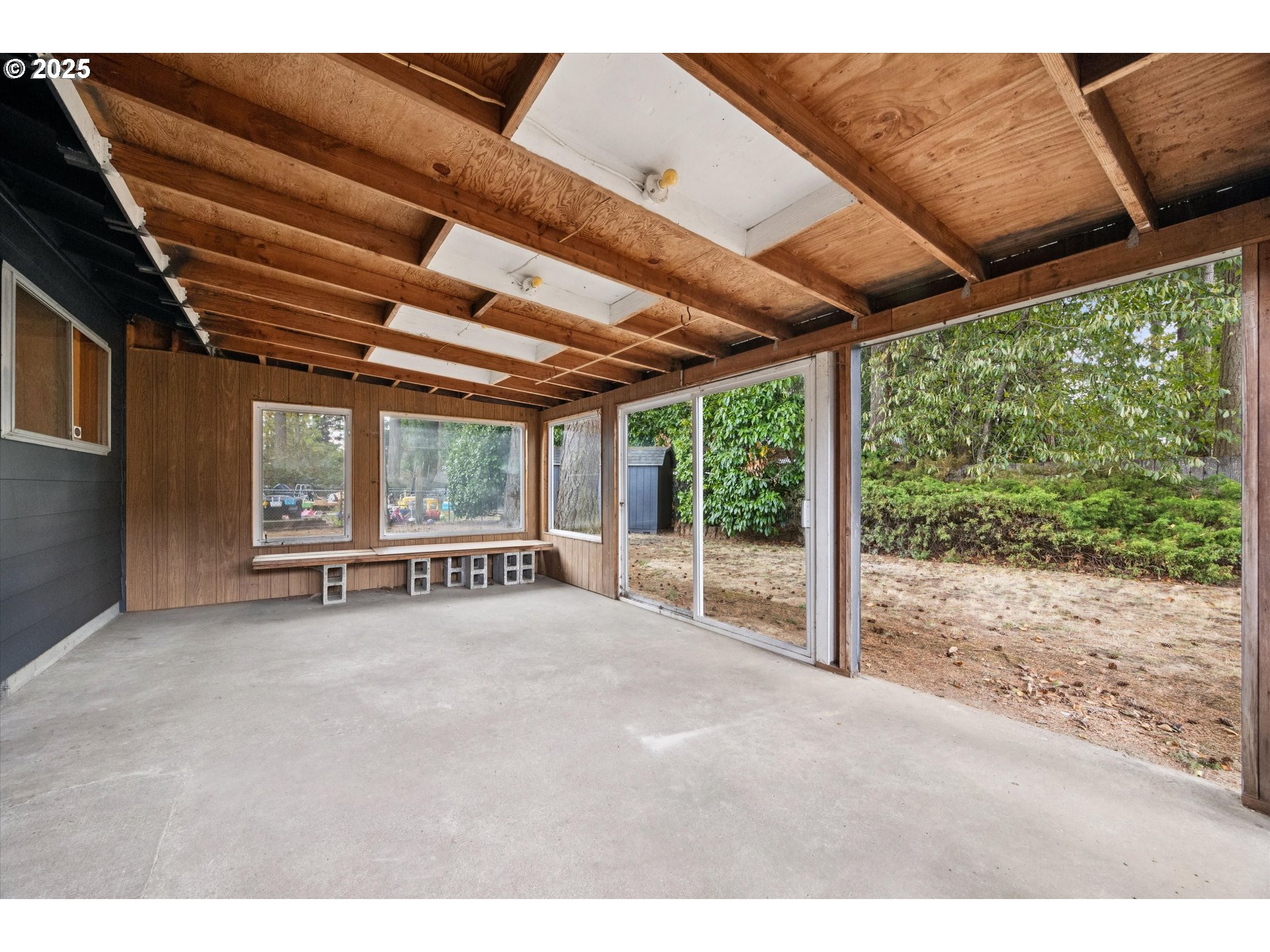 121 Southeast 166th Avenue Portland, OR 97233 - Photo 27 of 27 a view of an empty room with wooden floor and a window