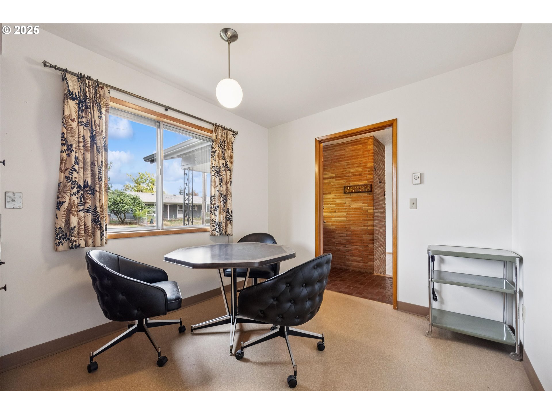121 Southeast 166th Avenue Portland, OR 97233 - Photo 10 of 27 a living room with furniture and a window