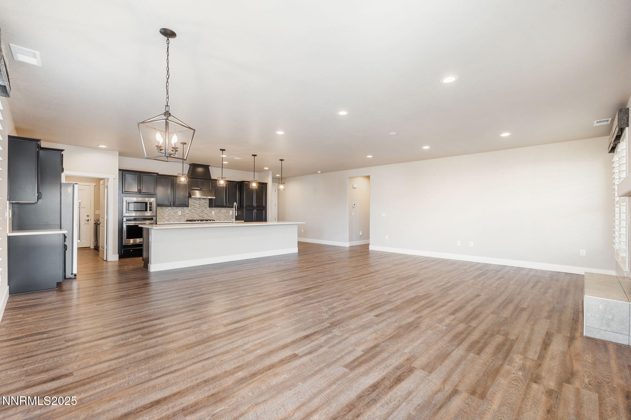 774 East Cottage Loop Gardnerville, NV 89460 - Photo 11 of 31 a view of a kitchen with stove and cabinets