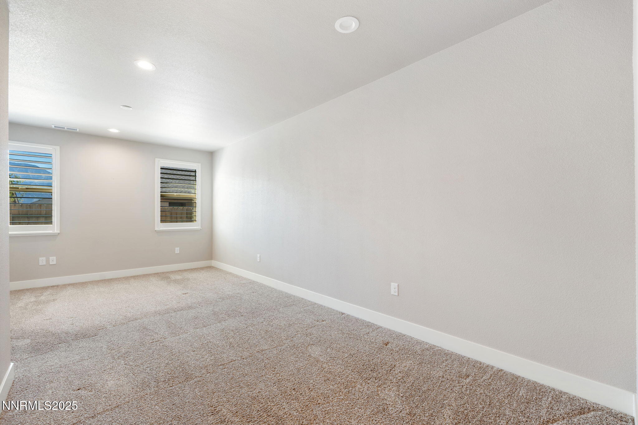 774 East Cottage Loop Gardnerville, NV 89460 - Photo 20 of 31 an empty room with windows