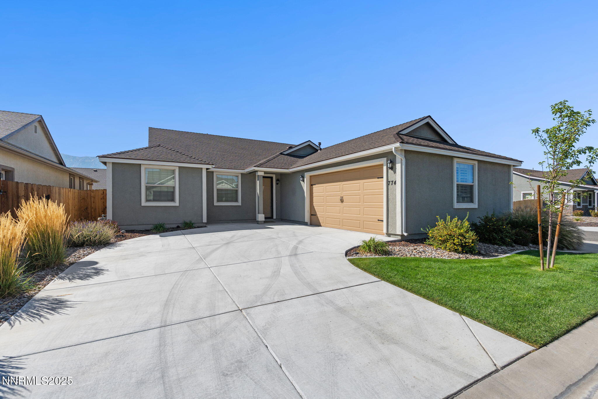 774 East Cottage Loop Gardnerville, NV 89460 - Photo 2 of 31 a view of a house with a yard