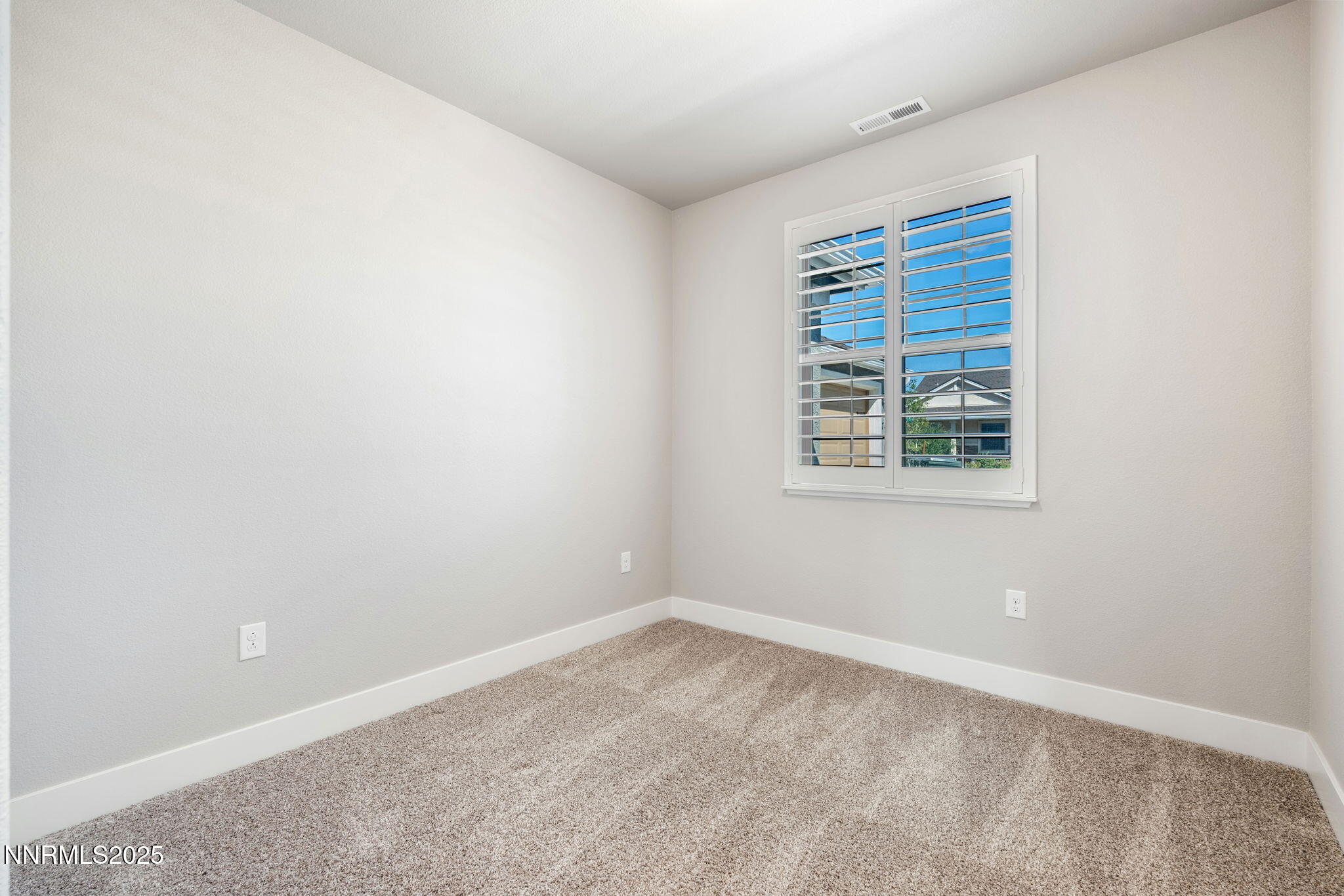 774 East Cottage Loop Gardnerville, NV 89460 - Photo 24 of 31 an empty room with a window