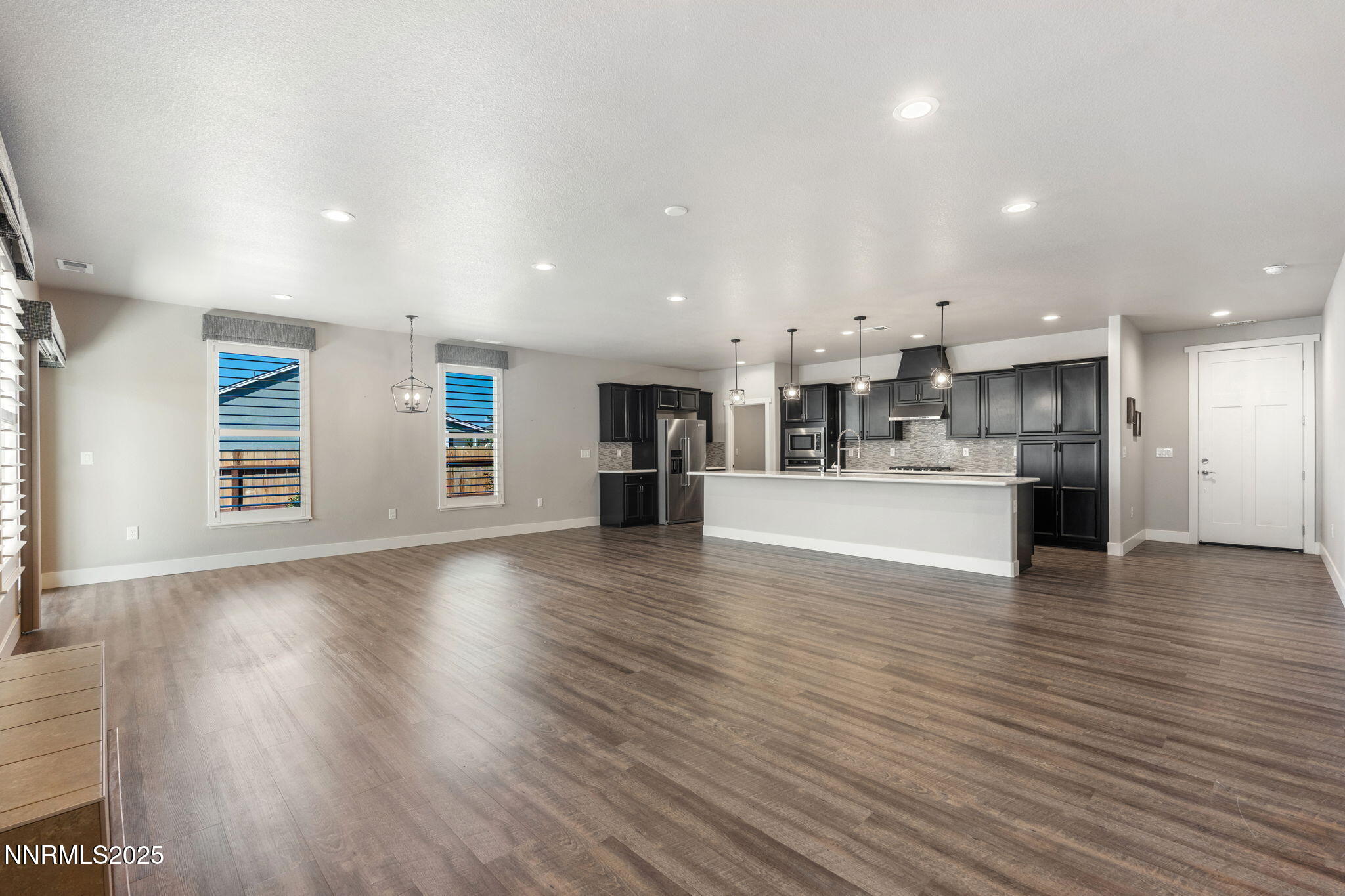 774 East Cottage Loop Gardnerville, NV 89460 - Photo 5 of 31 a view of a kitchen with cabinets and wooden floor