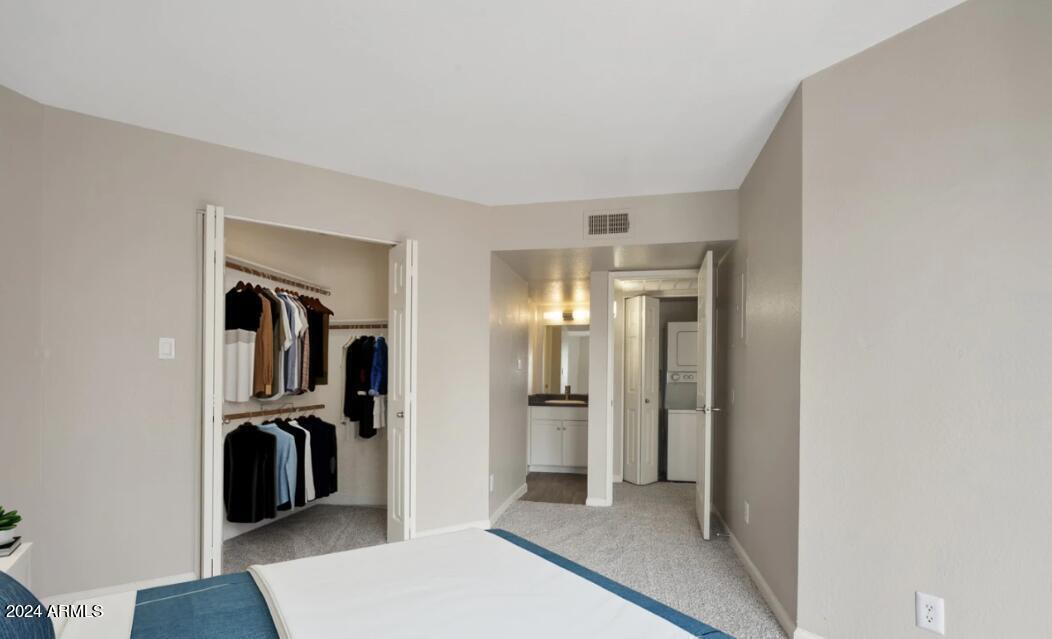1820 East Bell De Mar Drive, Unit B2 Tempe, AZ 85283 - Photo 3 of 8 a view of a hallway with a workspace
