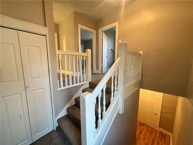 a view of an entryway with staircase
