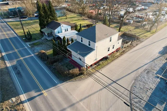 a house view with a backyard space