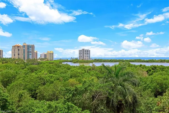 a view of a city with tall buildings in the background