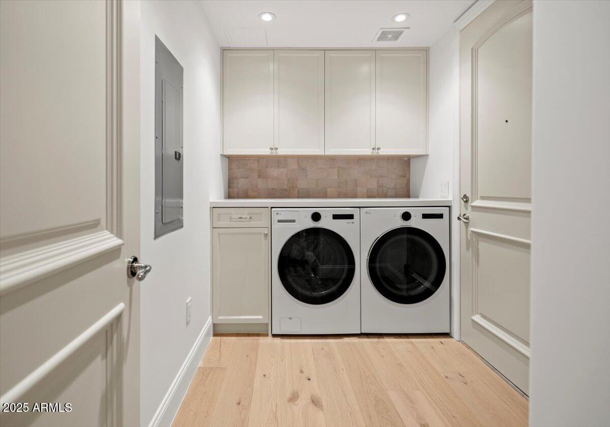 7181 East Camelback Road, Unit 301 Scottsdale, AZ 85251 - Photo 17 of 22 a utility room with dryer and washer