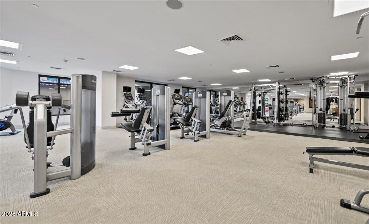 7181 East Camelback Road, Unit 301 Scottsdale, AZ 85251 - Photo 20 of 22 a view of a room with gym equipment