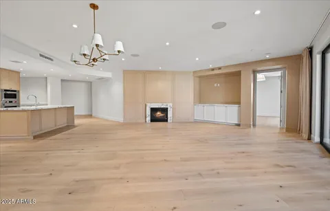 a view of a livingroom with a kitchen