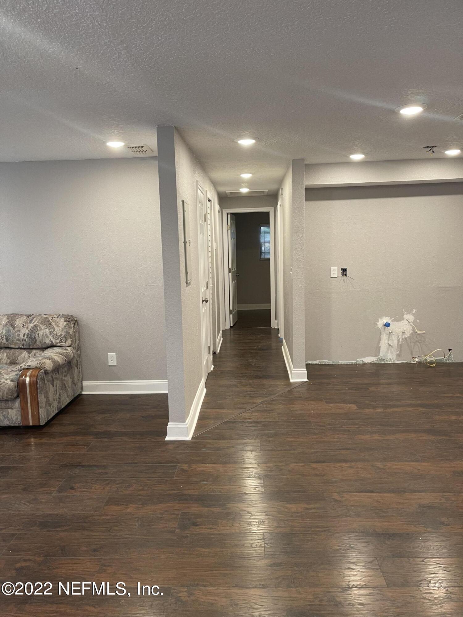 3111 Ray Road Jacksonville, FL 32209 - Photo 9 of 19 a view of a livingroom with wooden floor