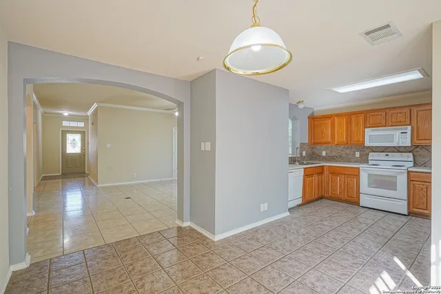 a view of a kitchen with a sink and dishwasher kitchen view