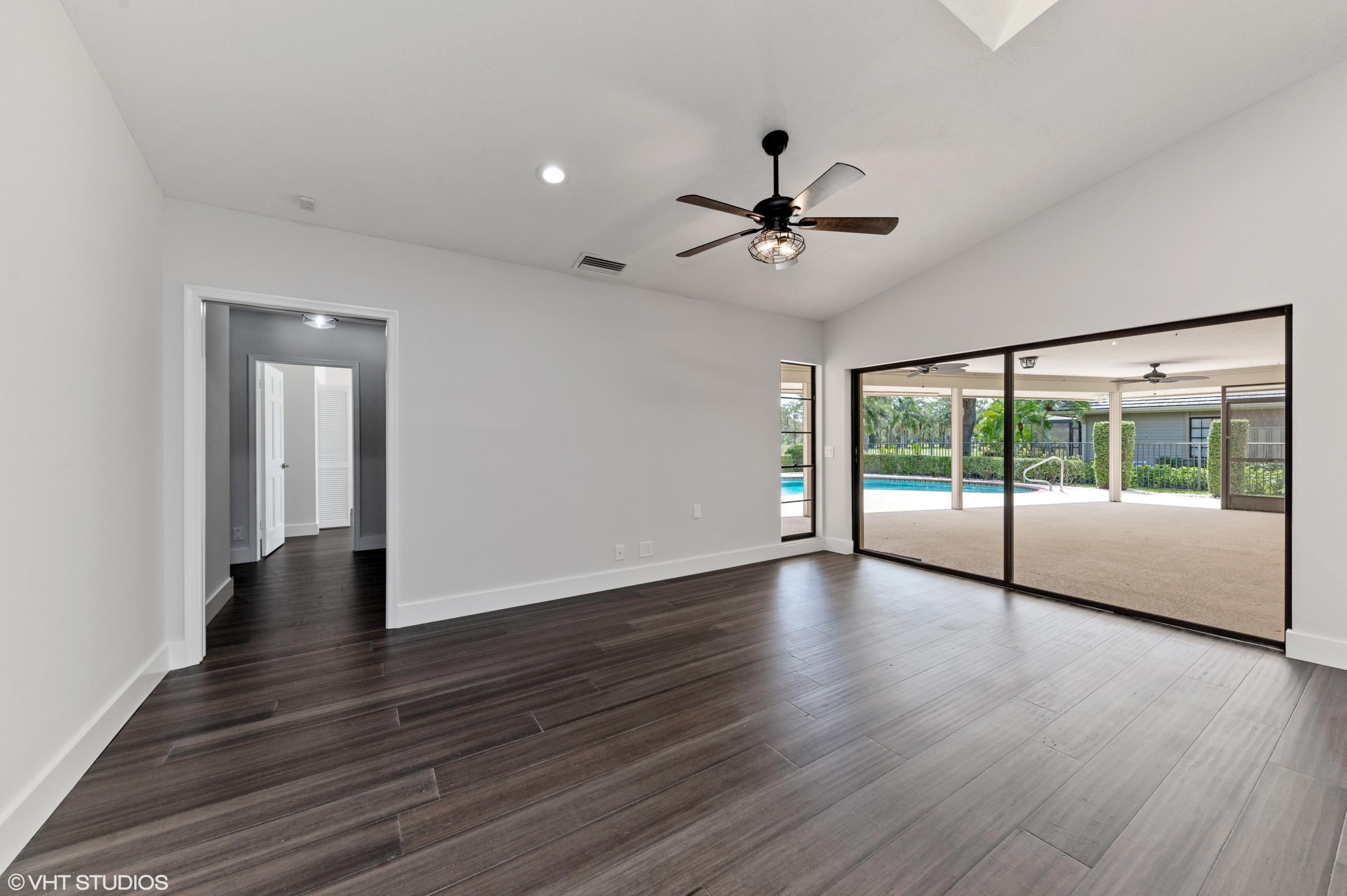 58 Dunbar Road Palm Beach Gardens, FL 33418 - Photo 12 of 36 09_58DunbarRd_3_FamilyRoom_HiRes