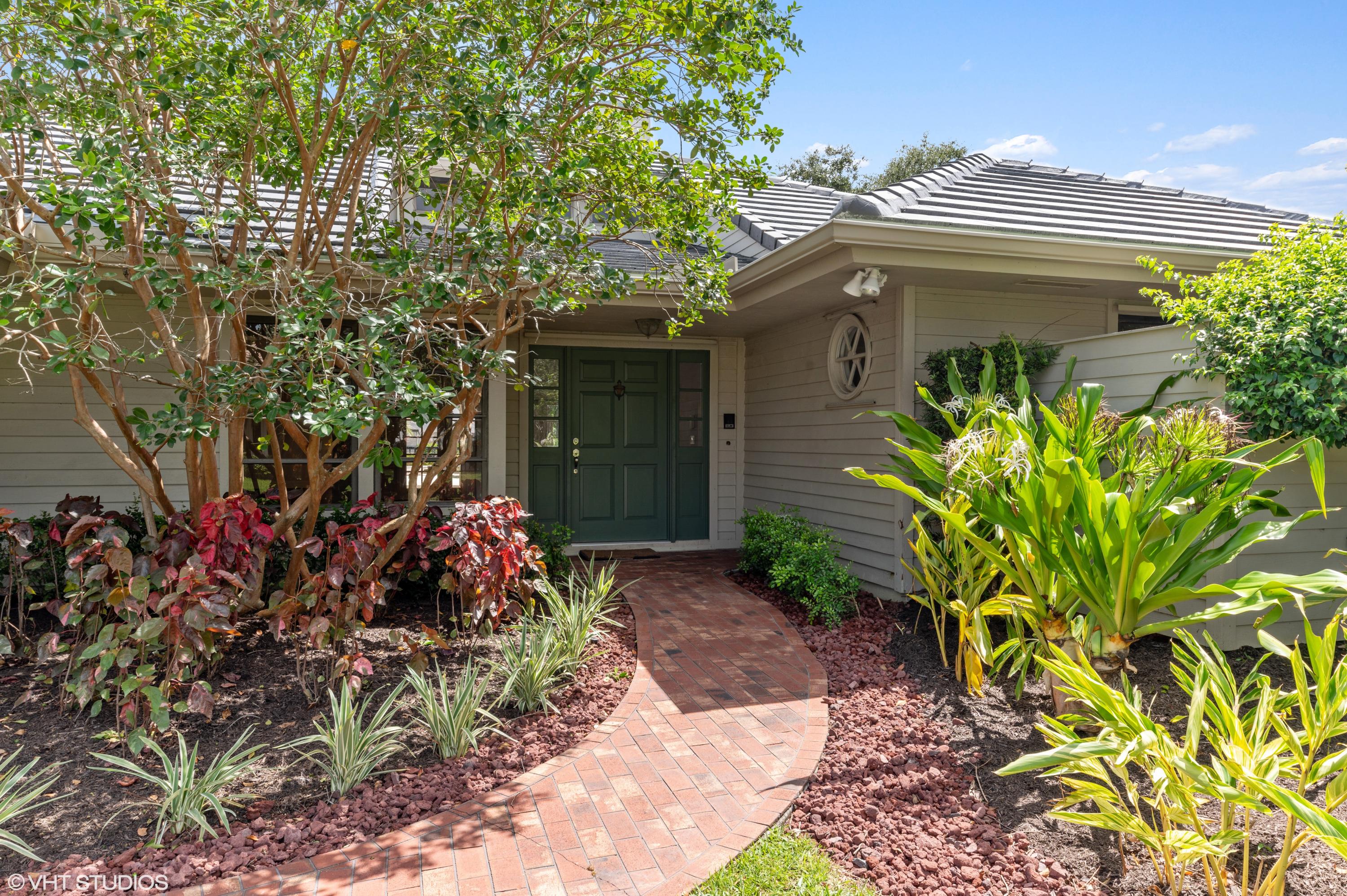 58 Dunbar Road Palm Beach Gardens, FL 33418 - Photo 2 of 36 Front entrance