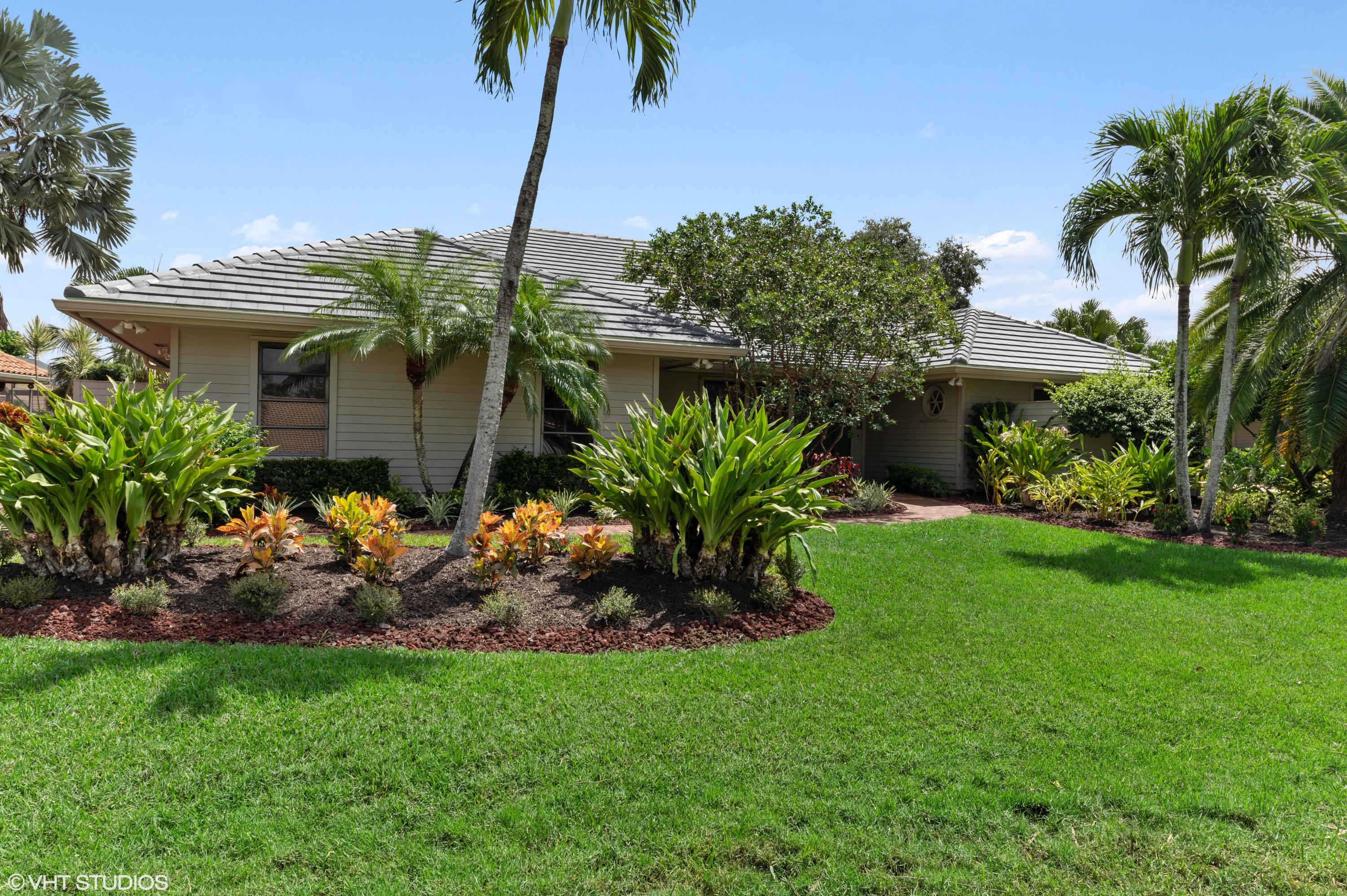 58 Dunbar Road Palm Beach Gardens, FL 33418 - Photo 25 of 36 Front yard
