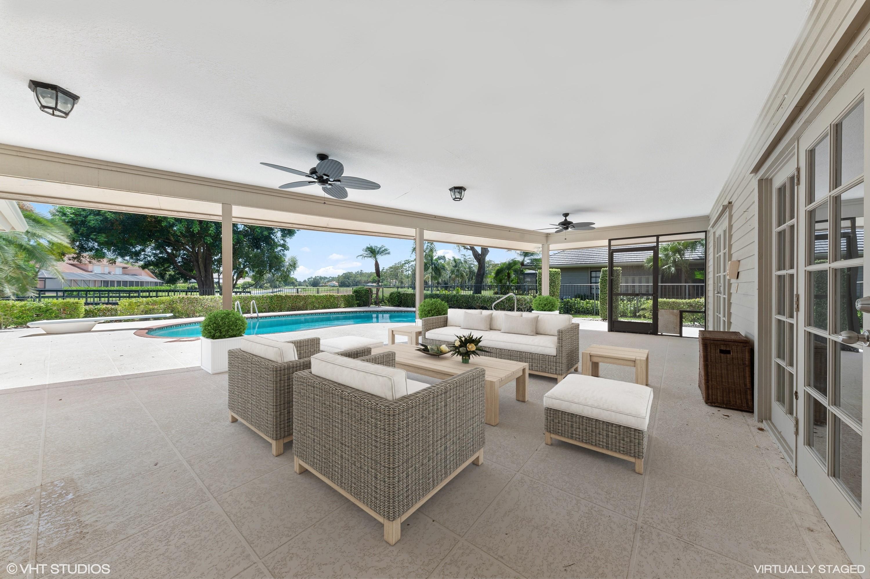 58 Dunbar Road Palm Beach Gardens, FL 33418 - Photo 31 of 36 Covered lanai