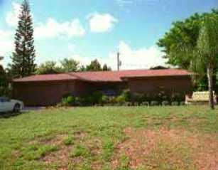 1450 Southeast 11th Street Stuart, FL 34996 - Photo 1 of 1 a view of a backyard