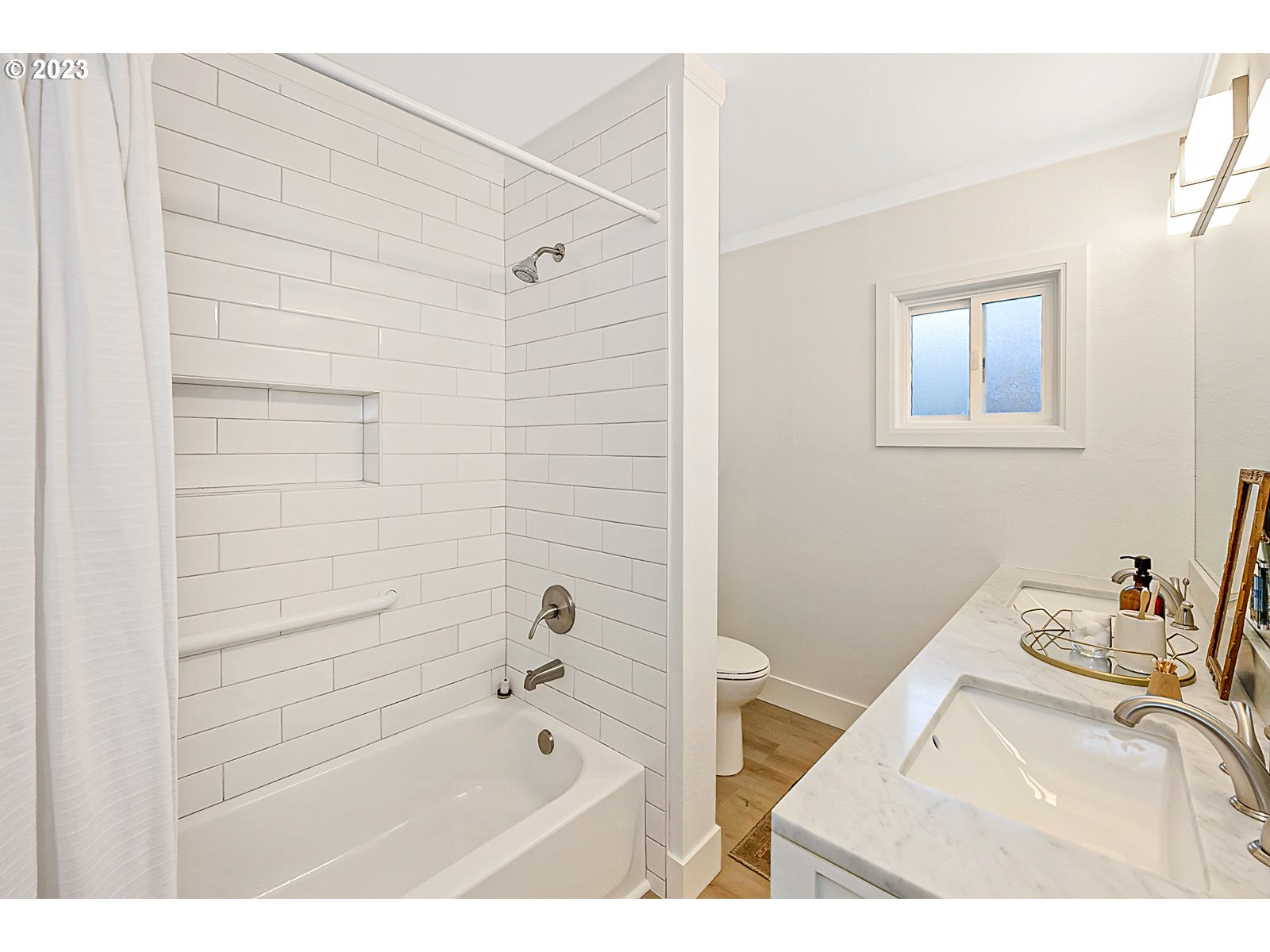 8900 Southwest 69th Avenue Portland, OR 97223 - Photo 19 of 31 a bathroom with a bathtub and shower
